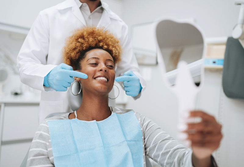 Smiling patient with Candid Clear Aligners at the dental clinic in Monroeville, PA